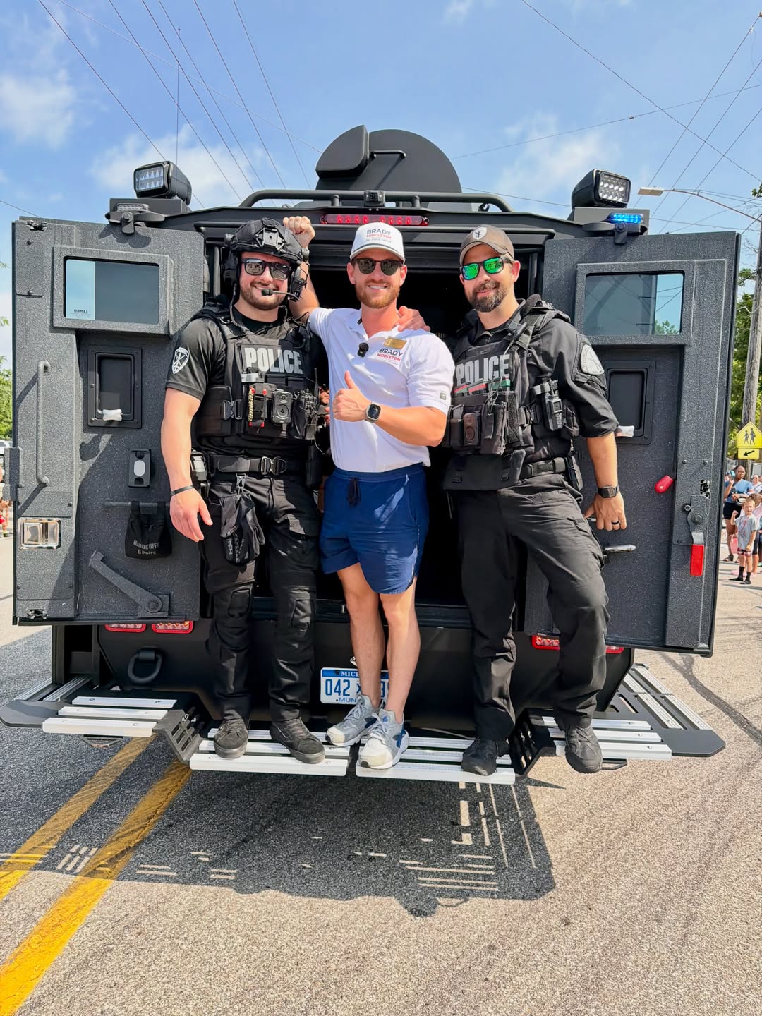 Brady Middleton with local police officers